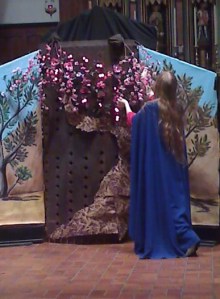 Mary (Alice Deegan) is delighted that the cherry tree blooms in the middle of winter just for her!